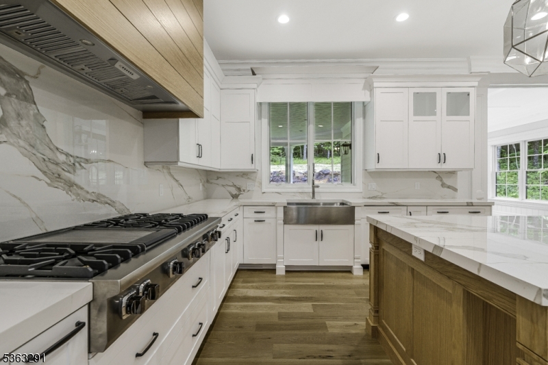 8 Cobblestone Court Warren, NJ 07059 - Photo 27 of 50 a kitchen with a stove sink and cabinets