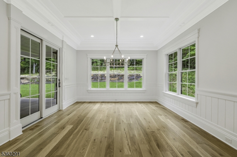 8 Cobblestone Court Warren, NJ 07059 - Photo 29 of 50 a view of empty room with wooden floor and fan