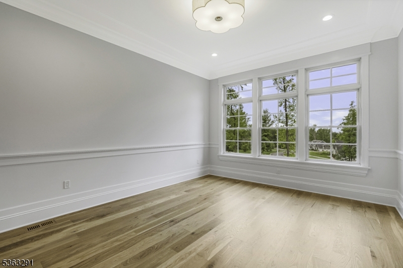 8 Cobblestone Court Warren, NJ 07059 - Photo 9 of 50 a view of room with window and hardwood floor