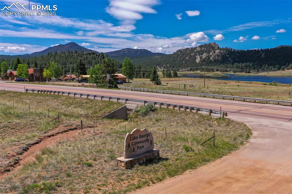 128 Osage Path Lake George, CO 80827 - Photo 13 of 22 a view of a lake with a mountain in the background