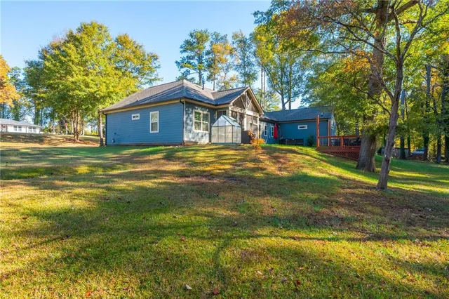 a view of a park with large trees