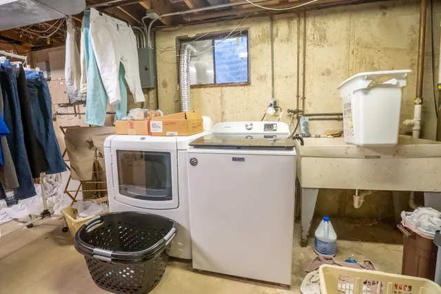 a kitchen with a stove and a sink
