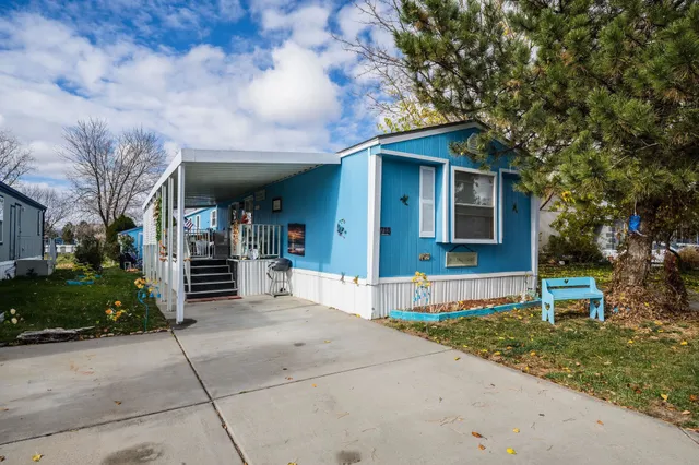 a front view of a house with a garage