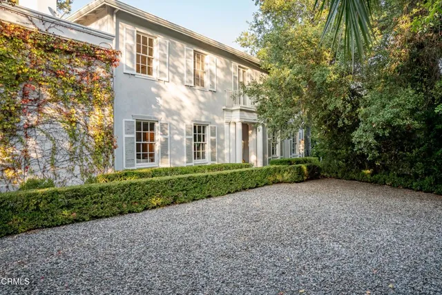 a view of a building with a street
