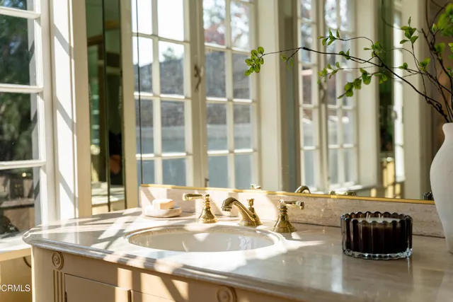 a bathroom with a bathtub and a sink