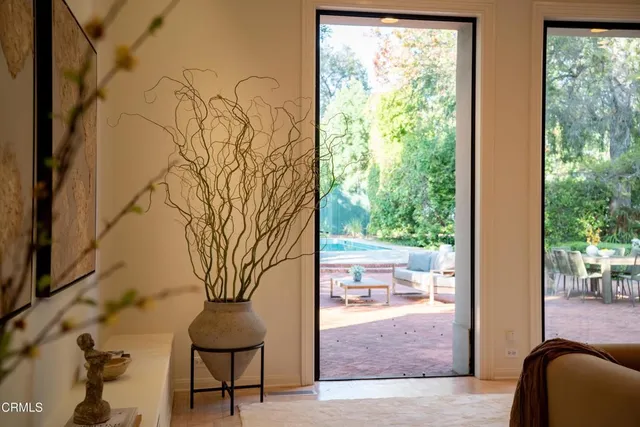 a view of backyard with tub and wooden floor