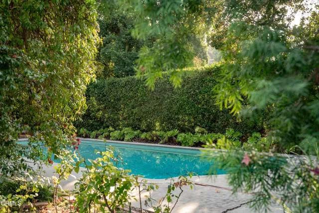 an aerial view of residential house with outdoor space