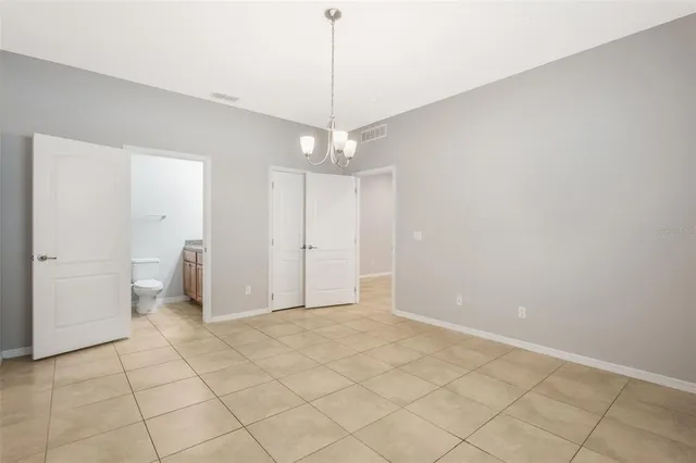 a view of a room with a sink and a shower