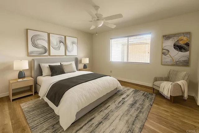 a bedroom with bed and window