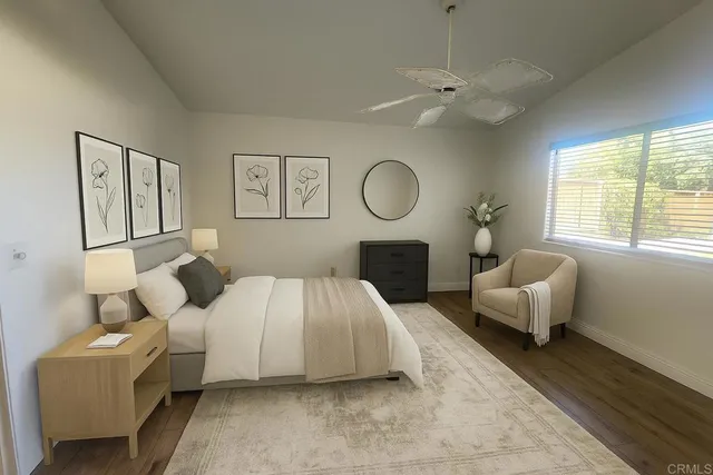 a bedroom with a bed and window