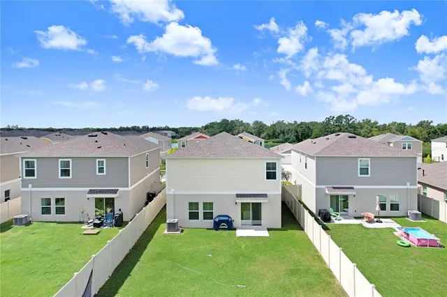 a view of a house with a big yard