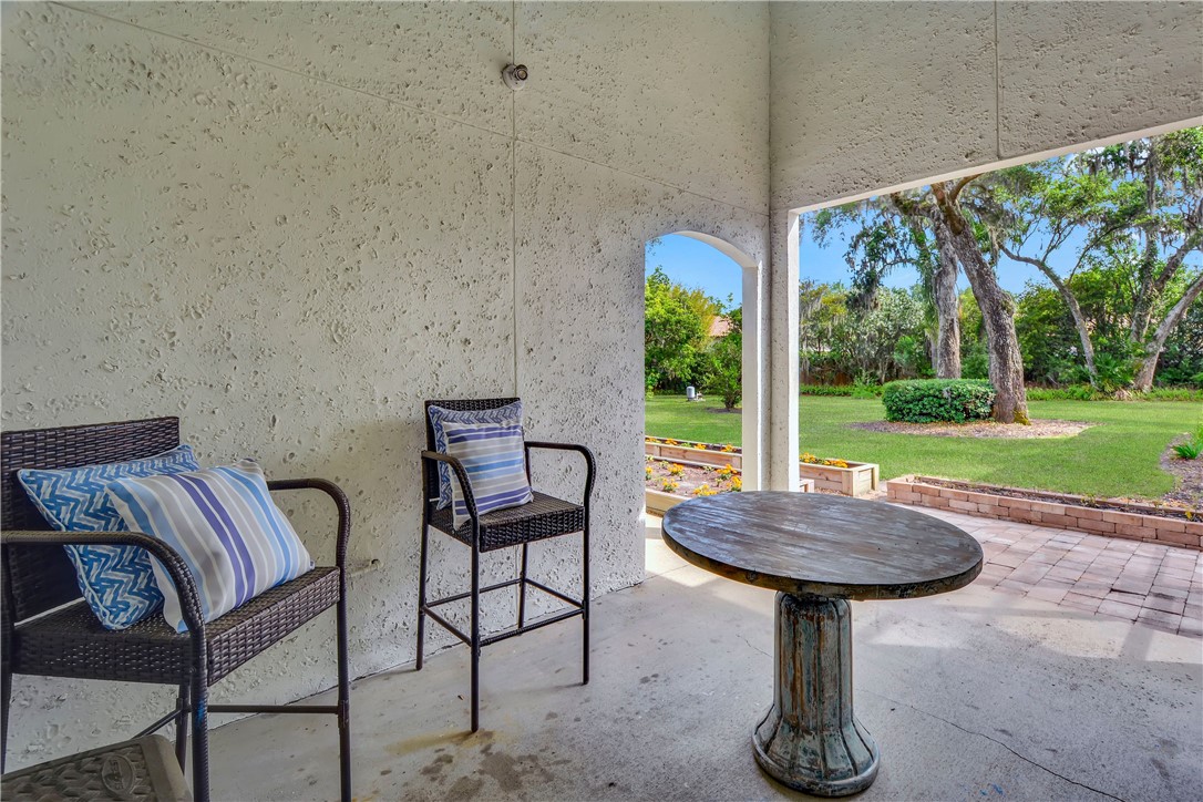 12 Plantation Way St. Simons Island, GA 31522 - Photo 32 of 42 Back yard patio
