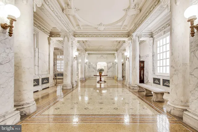 a view of a living room and entry way
