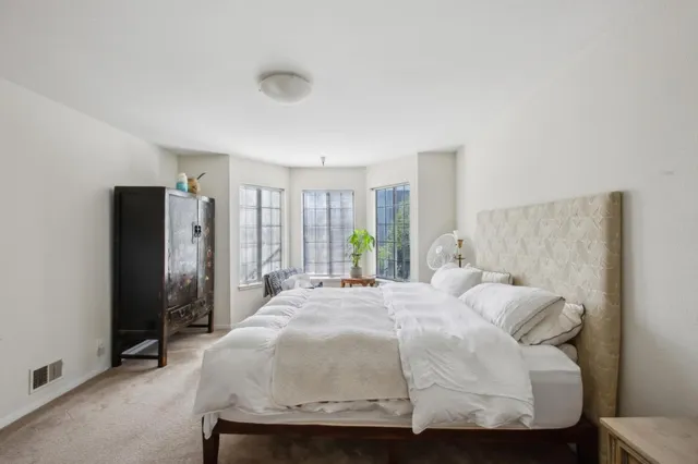 a view of a bathroom from a hallway