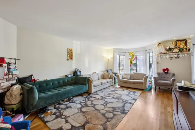 a kitchen with stainless steel appliances a refrigerator and a stove top oven