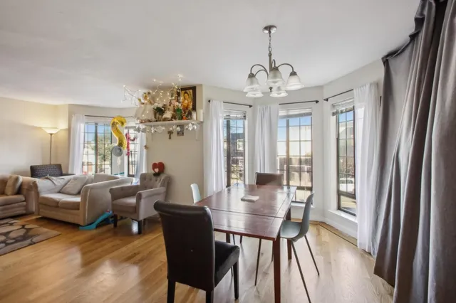 a bed room with a bed and a dresser