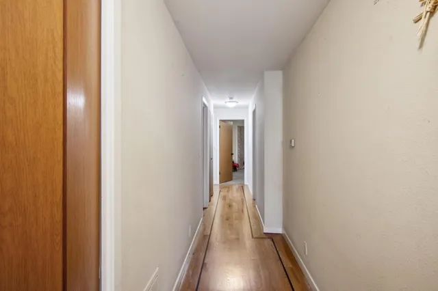 a bedroom with a bed and a tv