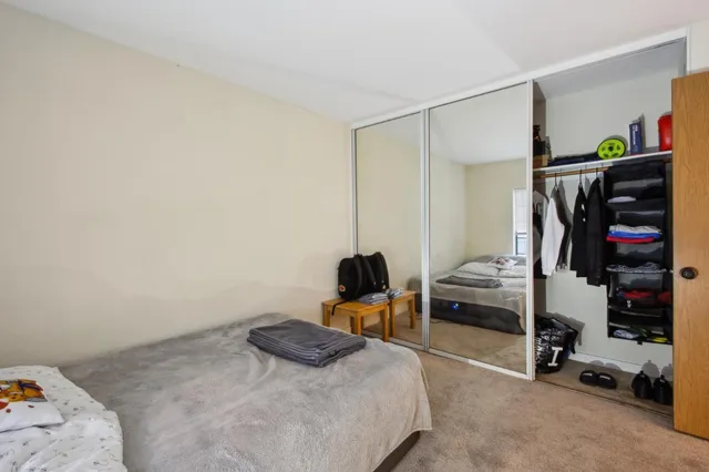 a view of a closet with storage