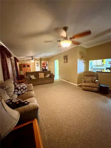 a bed room with furniture and a window