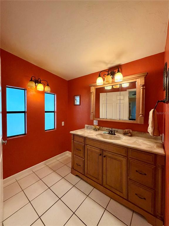 1329 Southwest 44th Boulevard Okeechobee, FL 34974 - Photo 21 of 39 a kitchen with a sink and cabinets