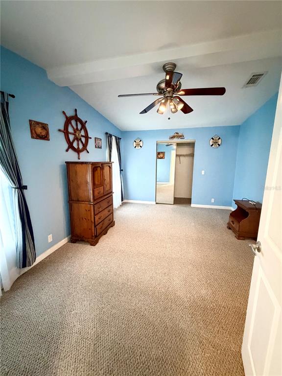 1329 Southwest 44th Boulevard Okeechobee, FL 34974 - Photo 25 of 39 a view of a livingroom with a chandelier furniture and a chandelier