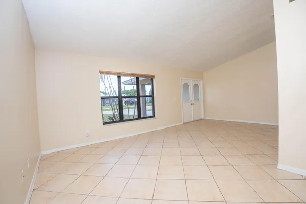 a view of an empty room and window