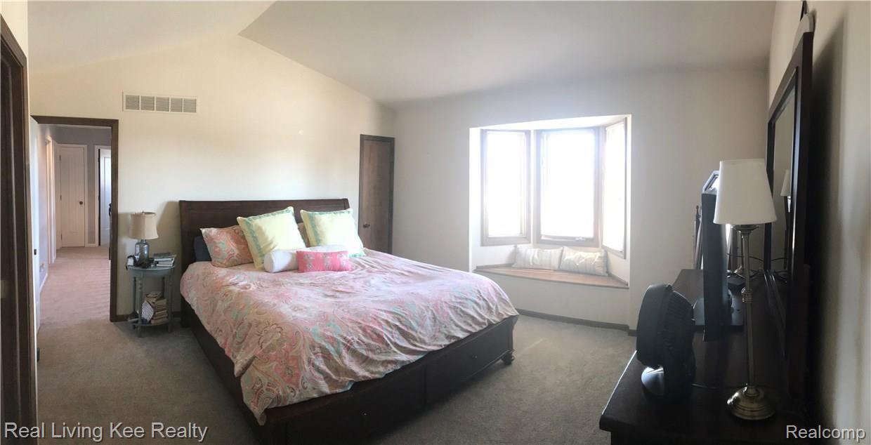 825 Augusta Drive Rochester, MI 48309 - Photo 15 of 28 Bright Master Bedroom with cathedral ceiling