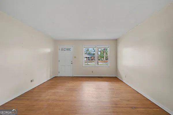 an empty room with windows