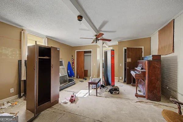 a view of game room with gym equipment