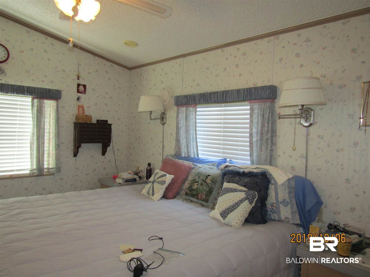 158 Defuniak Loop Lillian, AL 36549 - Photo 12 of 20 Has king bed with 2 end tables. Large bedroom