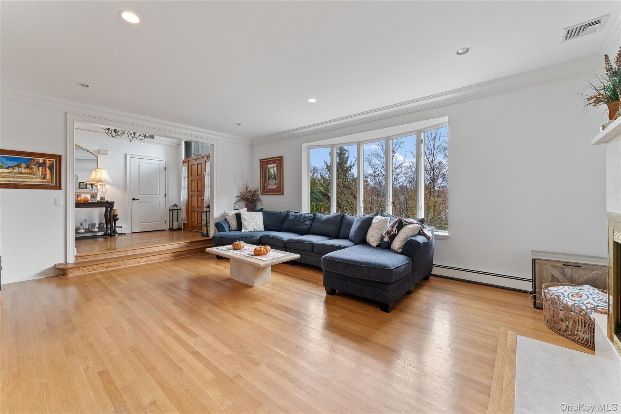 6 Hunting Ridge Road White Plains, NY 10605 - Photo 5 of 32 a living room with furniture and a large window