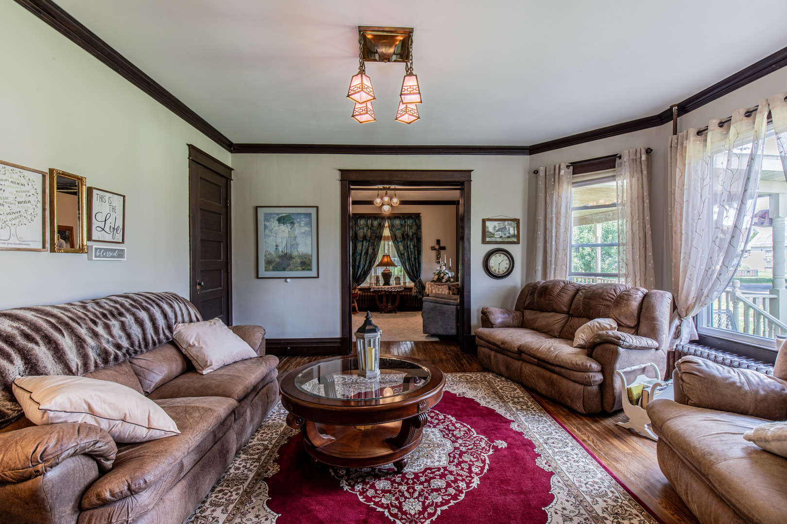 304 Locust Street Mineral, IL 61344 - Photo 14 of 38 a living room with furniture and a large window