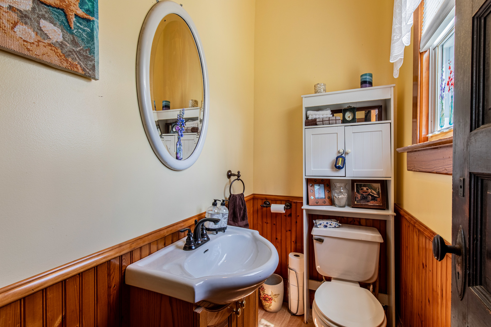304 Locust Street Mineral, IL 61344 - Photo 21 of 38 a bathroom with a toilet a sink and a mirror