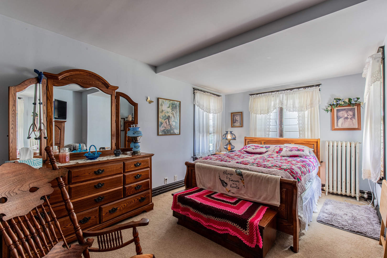 304 Locust Street Mineral, IL 61344 - Photo 24 of 38 a bedroom with a bed and wooden floor