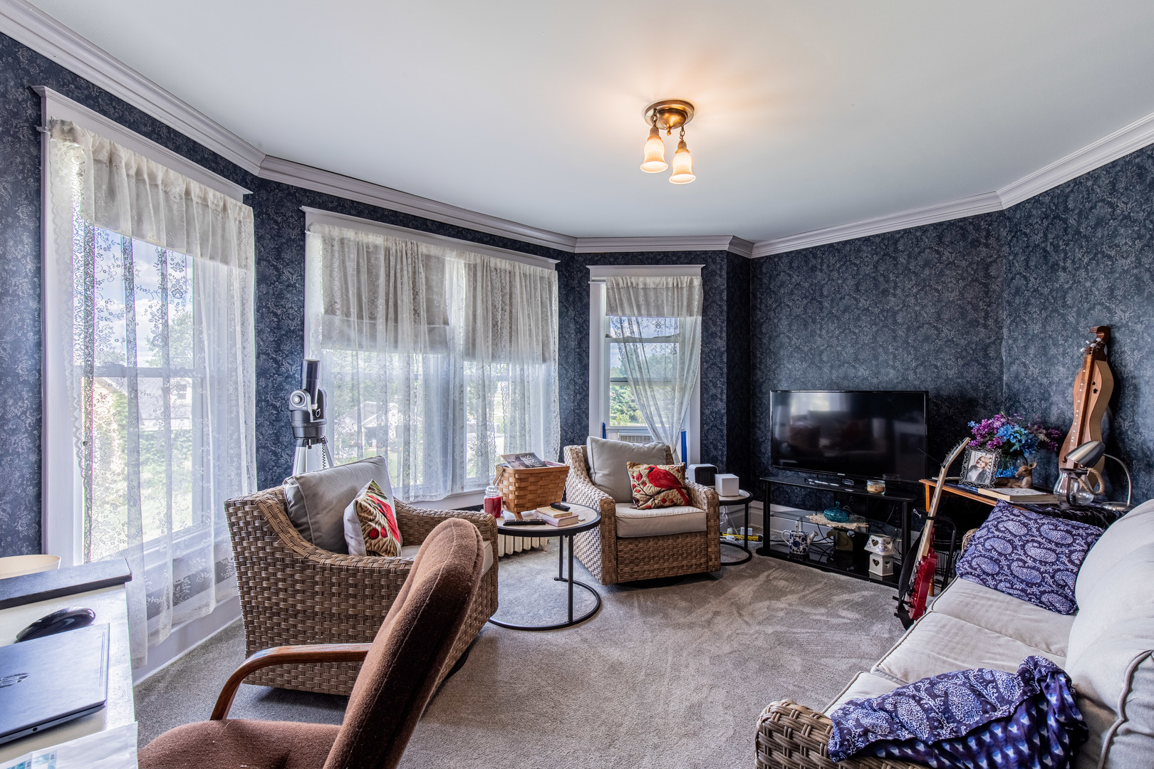304 Locust Street Mineral, IL 61344 - Photo 26 of 38 a living room with furniture and a flat screen tv