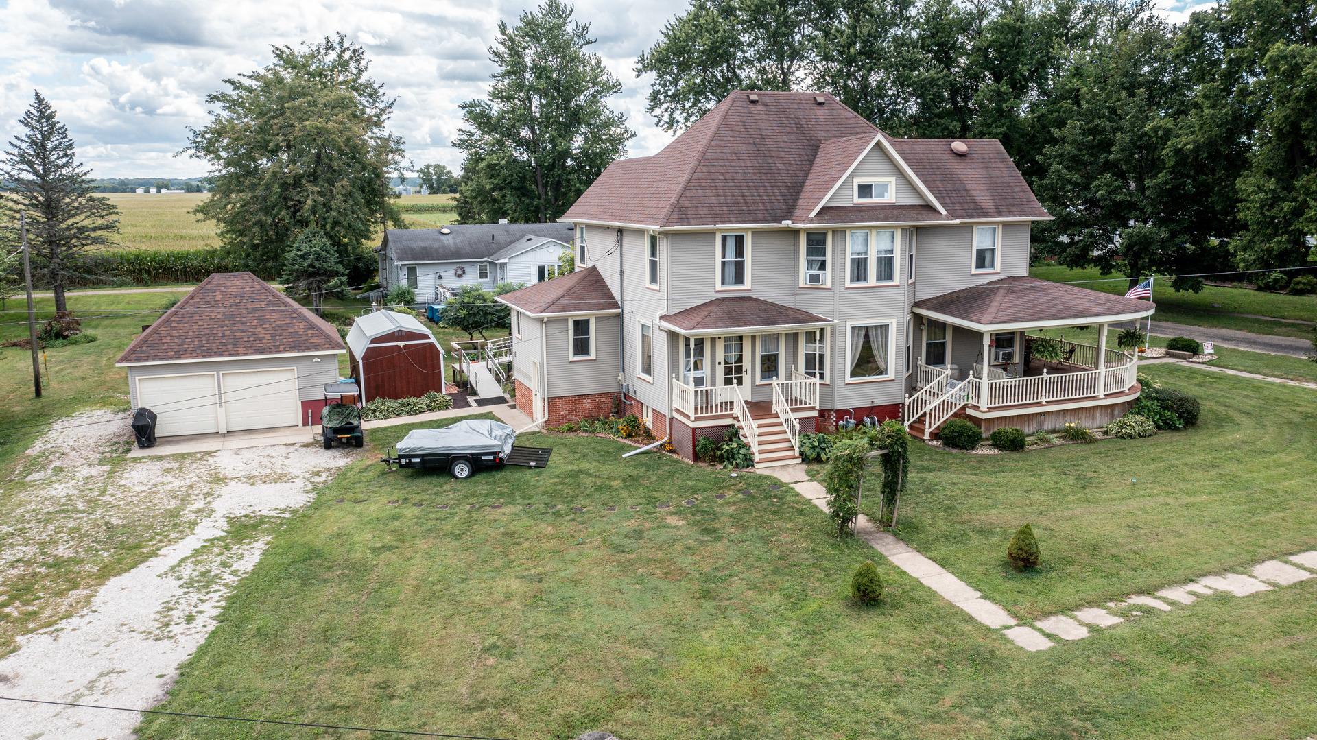 304 Locust Street Mineral, IL 61344 - Photo 32 of 38 a aerial view of a house with swimming pool and porch
