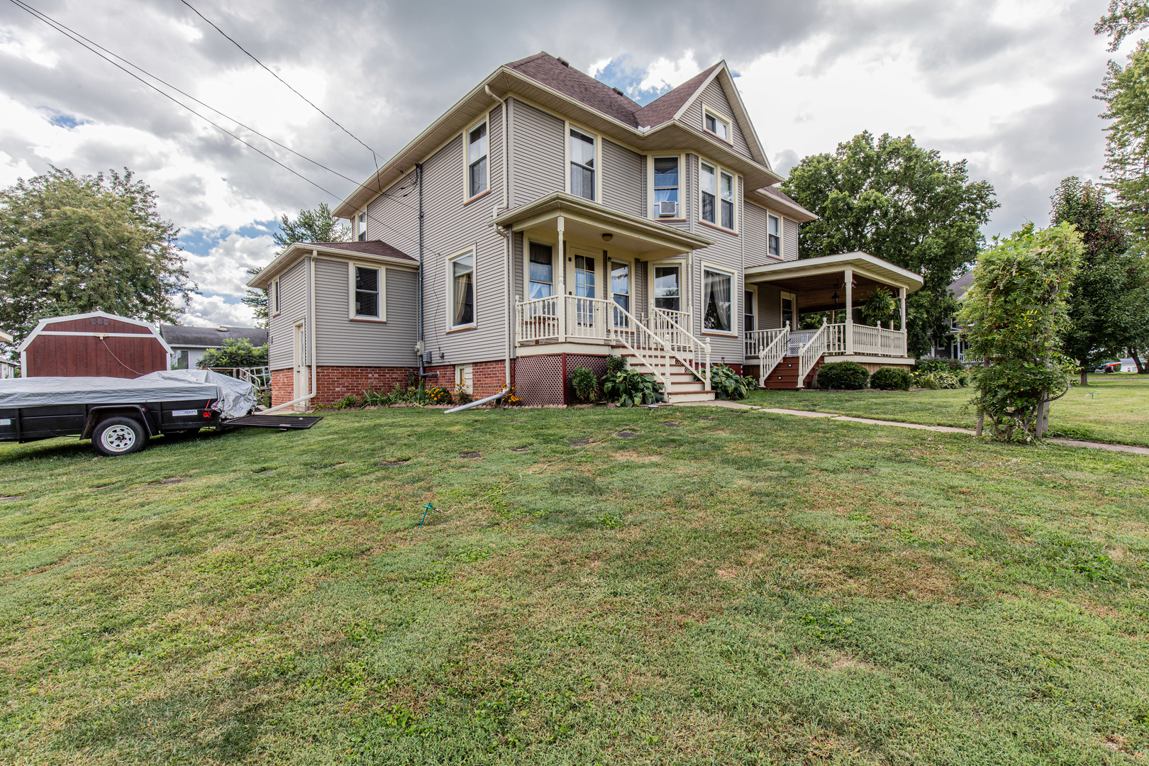 304 Locust Street Mineral, IL 61344 - Photo 33 of 38 a front view of a house with a garden