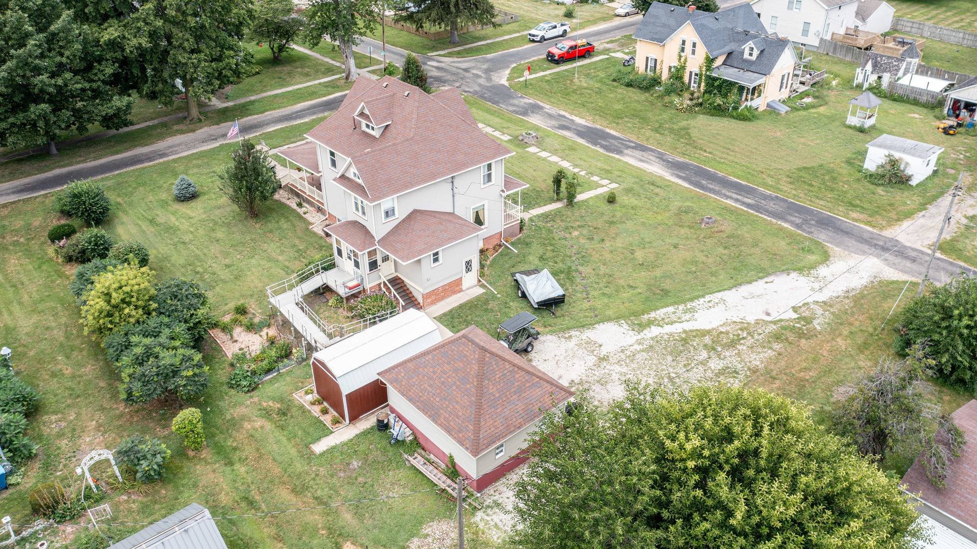 304 Locust Street Mineral, IL 61344 - Photo 36 of 38 an aerial view of residential house with outdoor space and swimming pool