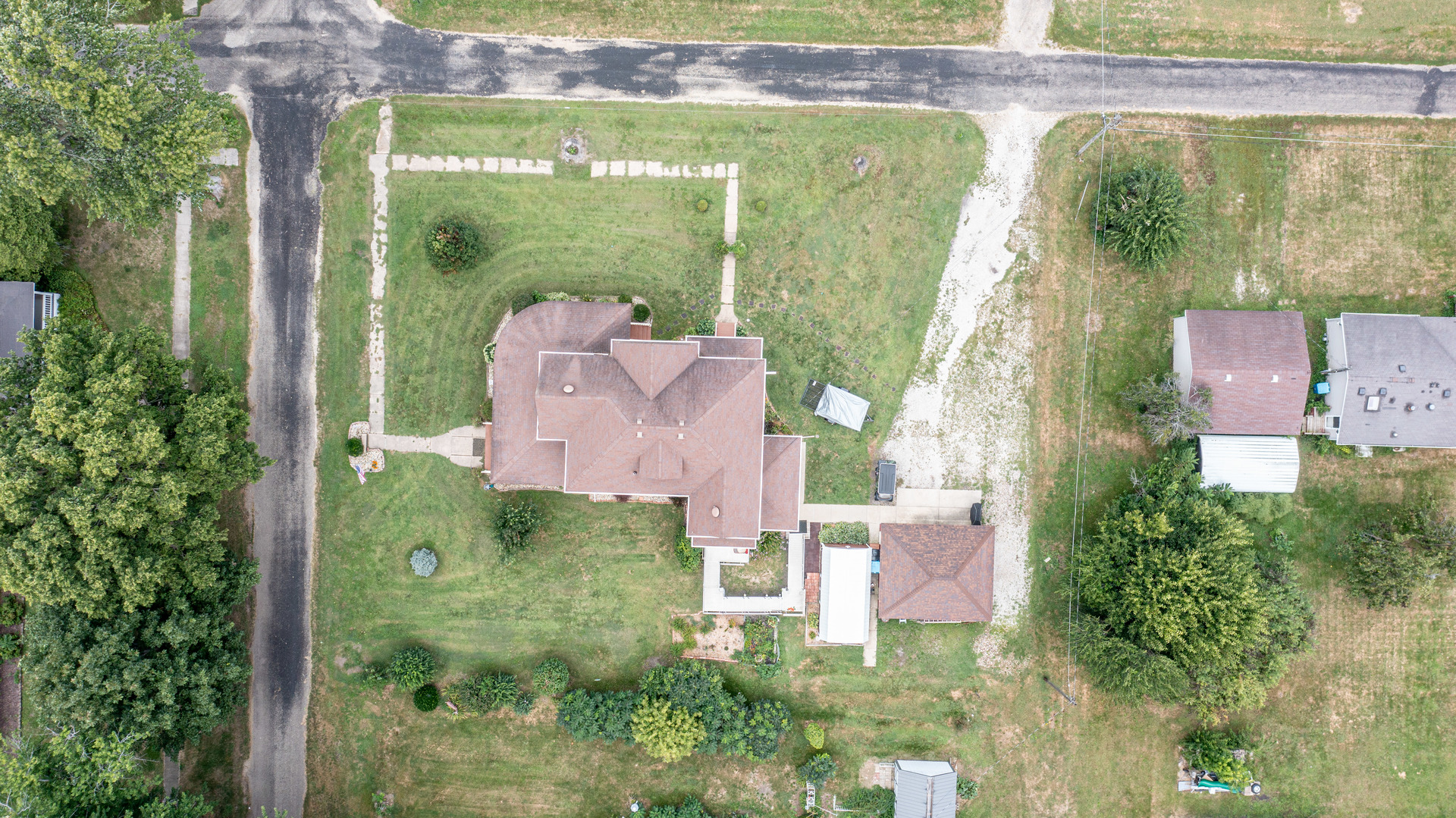 304 Locust Street Mineral, IL 61344 - Photo 38 of 38 an aerial view of residential houses with outdoor space and street view