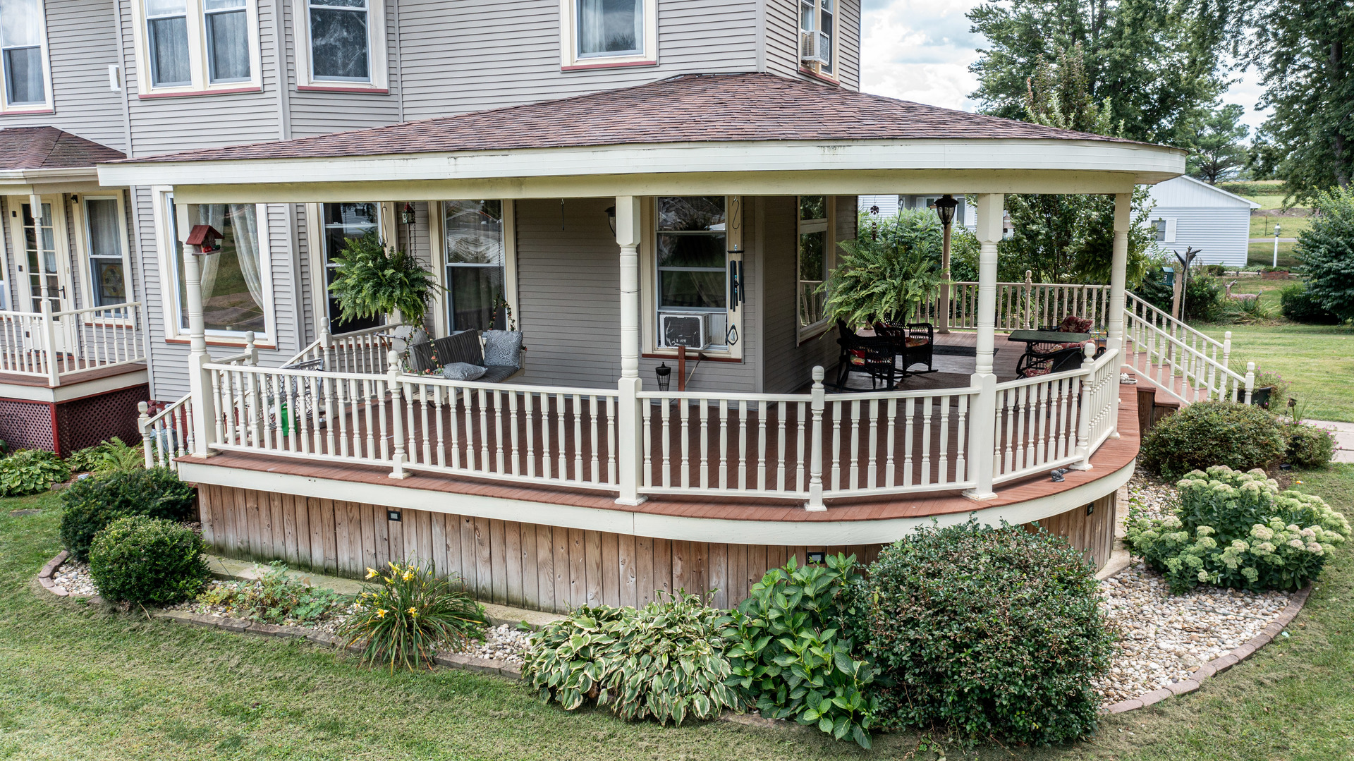 304 Locust Street Mineral, IL 61344 - Photo 4 of 38 a view of a house with a deck and garden
