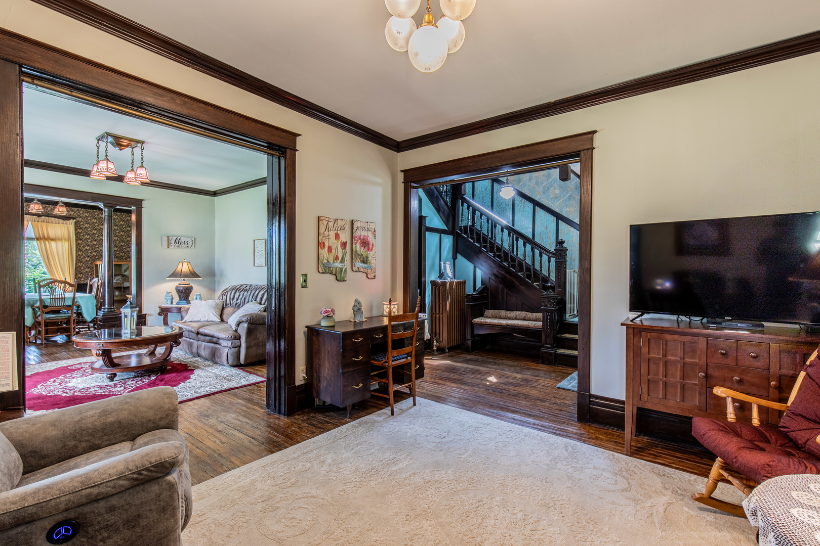 304 Locust Street Mineral, IL 61344 - Photo 10 of 38 a living room with furniture and a flat screen tv