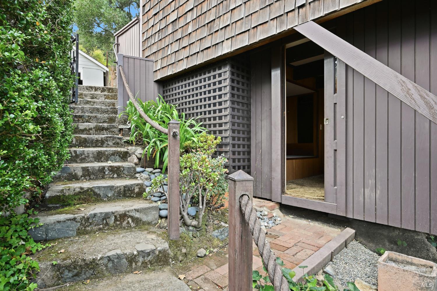 666 Redwood Avenue Corte Madera, CA 94925 - Photo 21 of 43 a backyard of a house with potted plants