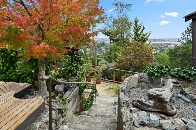 a view of a chairs and table in the patio