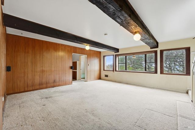 a view of a living room and a window