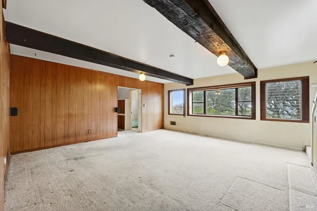 a view of a living room and a window