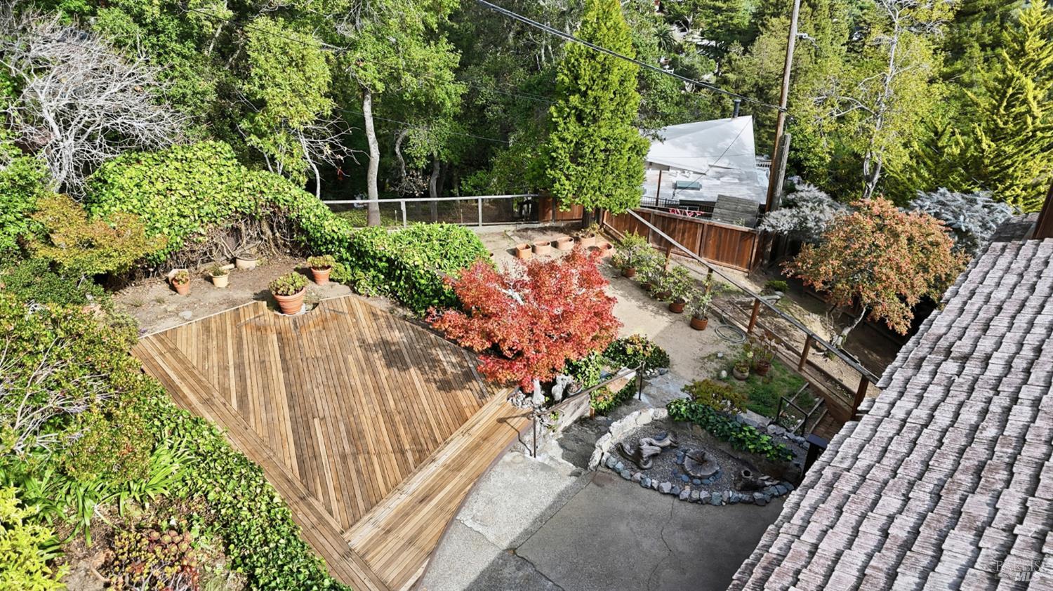 666 Redwood Avenue Corte Madera, CA 94925 - Photo 38 of 43 a view of a garden with wooden fence