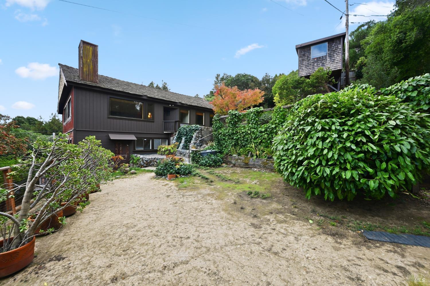666 Redwood Avenue Corte Madera, CA 94925 - Photo 39 of 43 a front view of a house with a yard