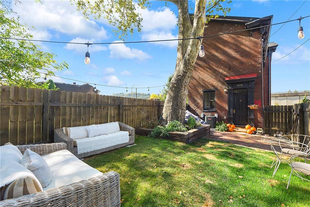 1426 Chateau Street Pittsburgh, PA 15233 - Photo 43 of 45 a outdoor living space with patio furniture and a fireplace