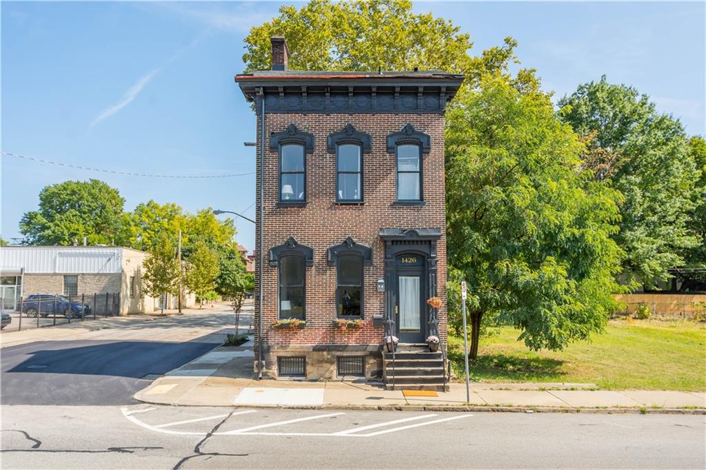 1426 Chateau Street Pittsburgh, PA 15233 - Photo 45 of 45 a building exterior with the table and chairs