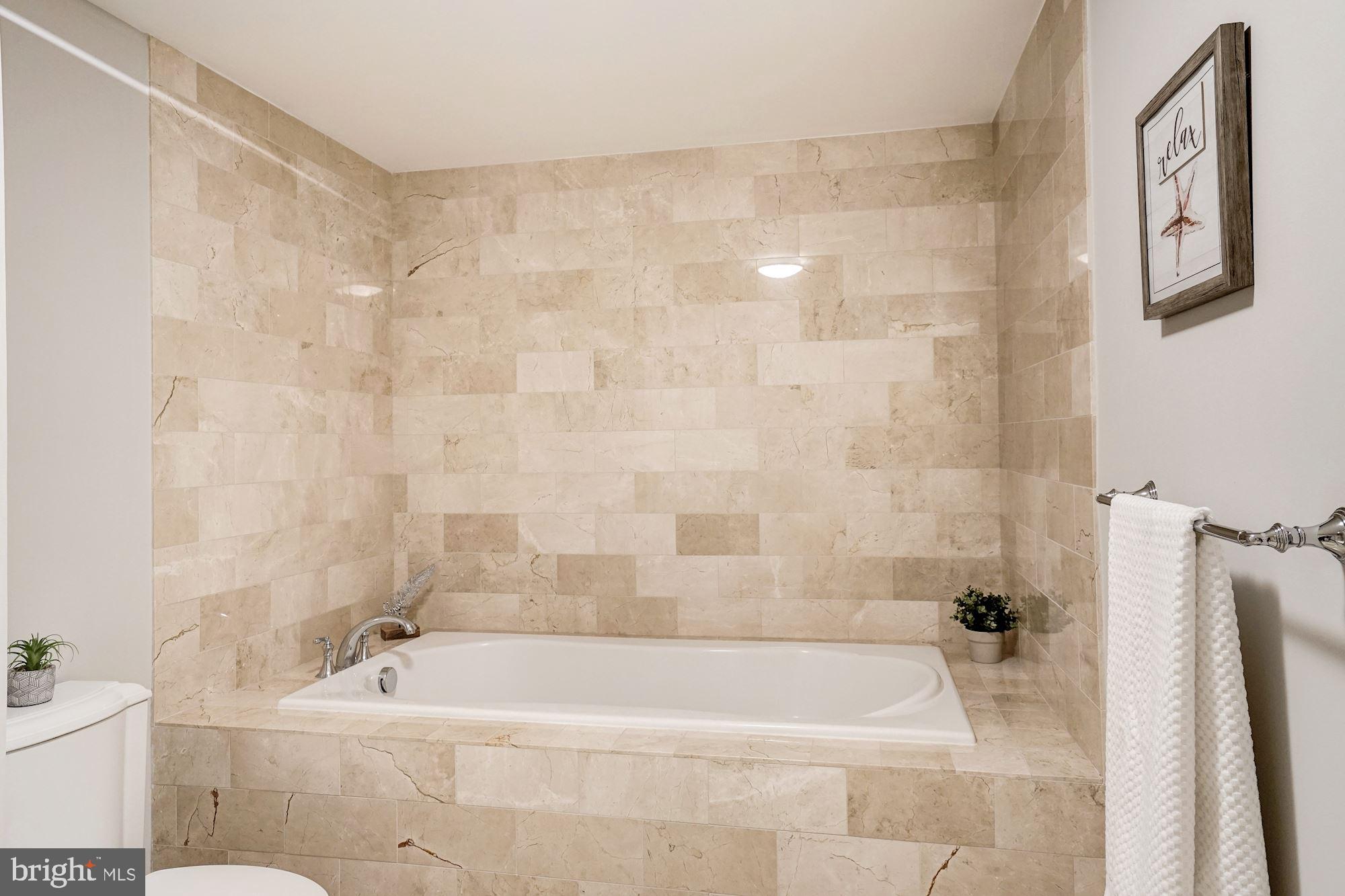2425 L Street Northwest, Unit 430 Washington, DC 20037 - Photo 21 of 29 Master Bathroom